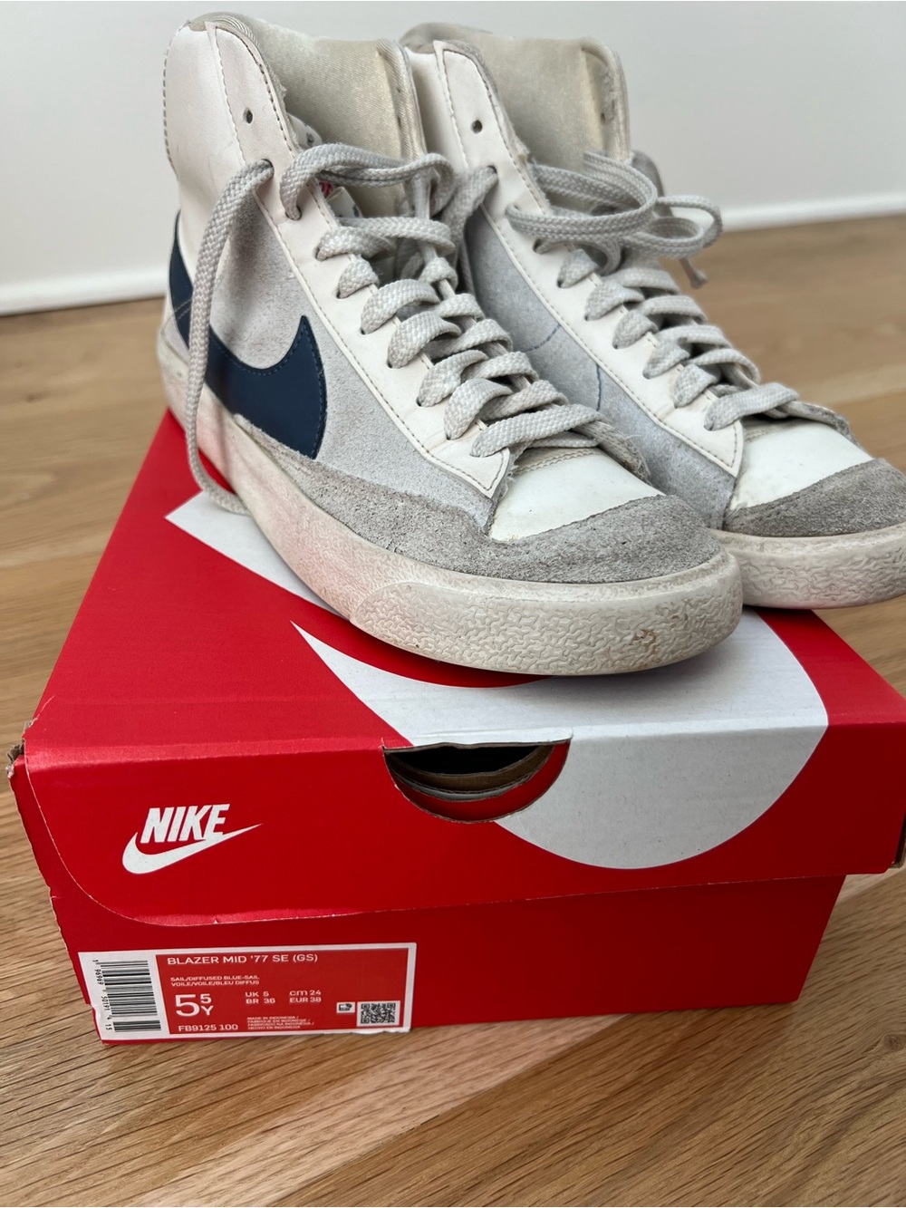 Nike Kids High-Top Sneaker in White and Blue